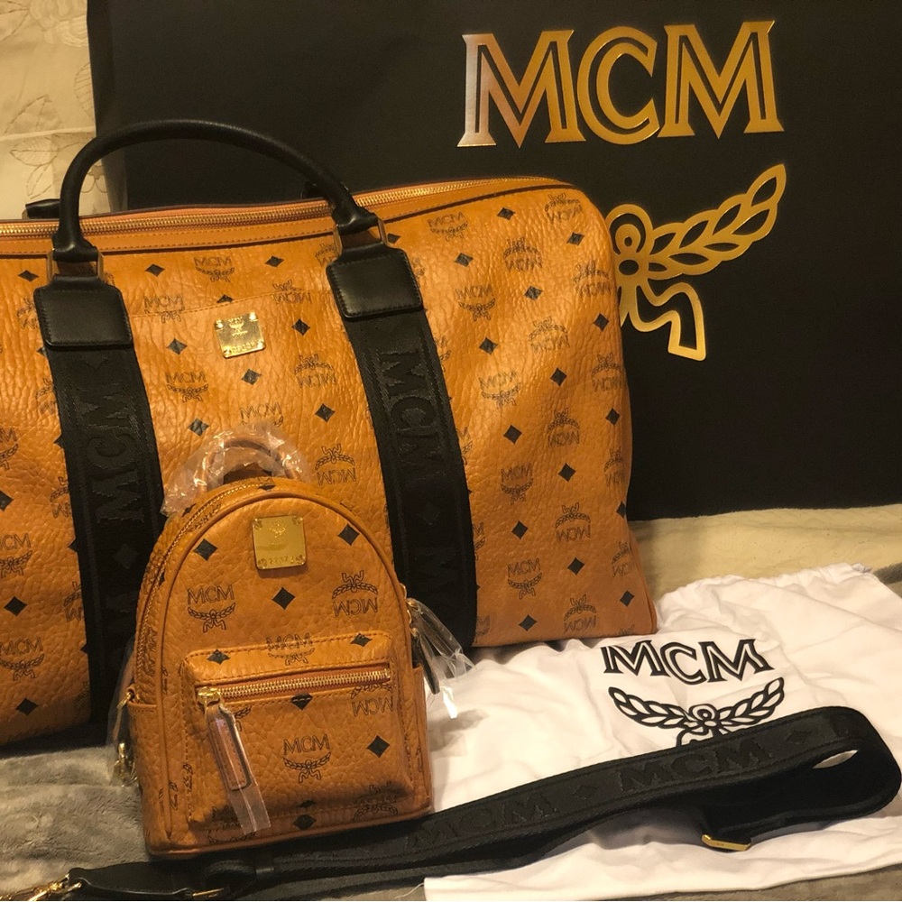 MCM Tan and Black Duffel Bags Luxury Collection